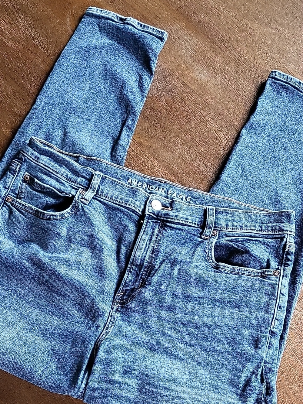 American Eagle medium blue denim jeans with metal button
